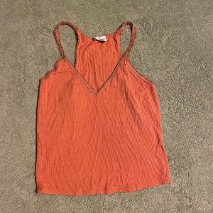 peachy orange tank top from Tilly’s!! 
size: SMALL
condition: like new